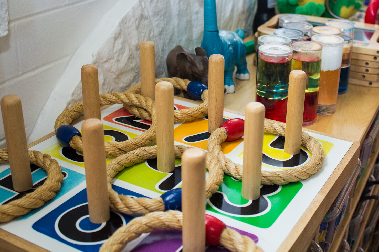 Ring toss — inside the Shining Stars classroom.
